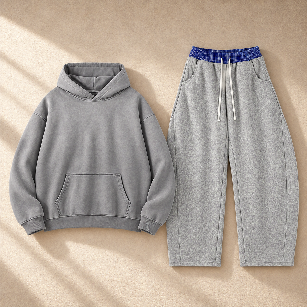 Home & Away Set - Gray: the 400 gsm Boyfriend Hoodie in Gray stacked above the 350 gsm Plaid Barrel Sweatpant in Flower Gray