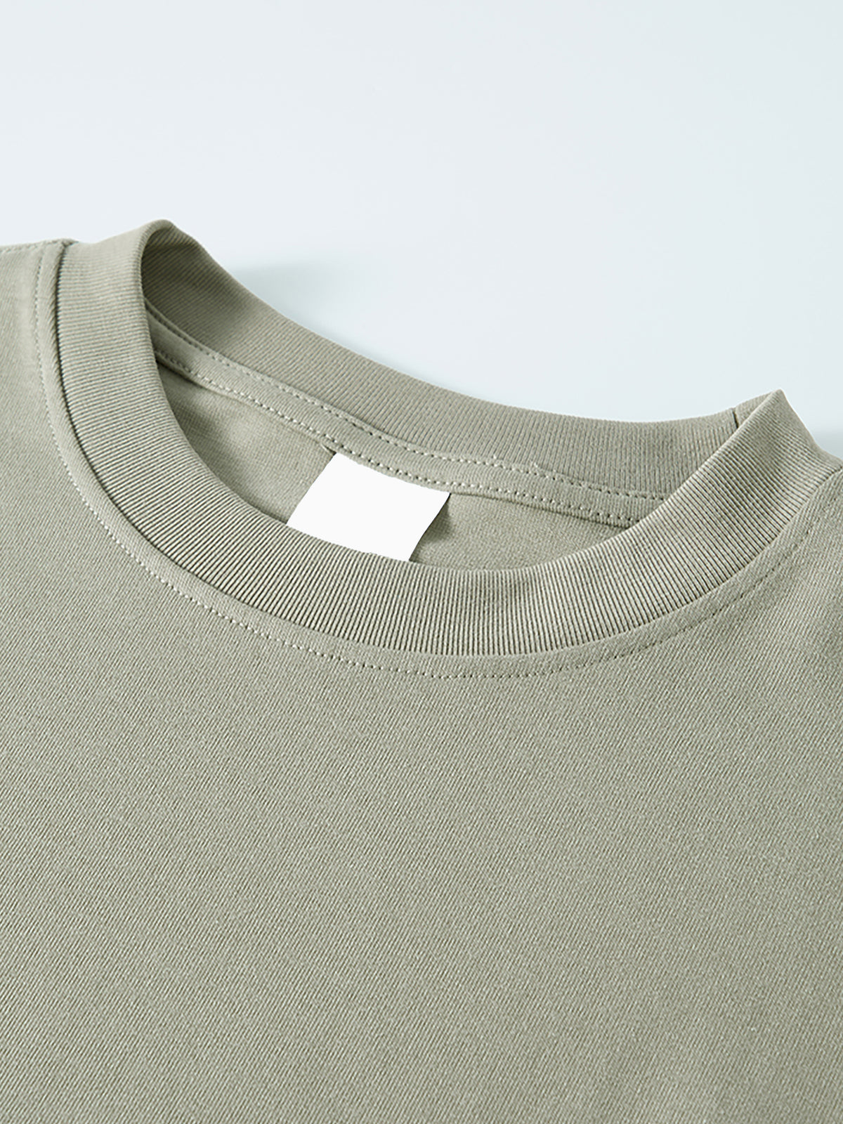 Home & Away Long Sleeve Tee in Oat Gray, construction detail, supplier photograph of the garment