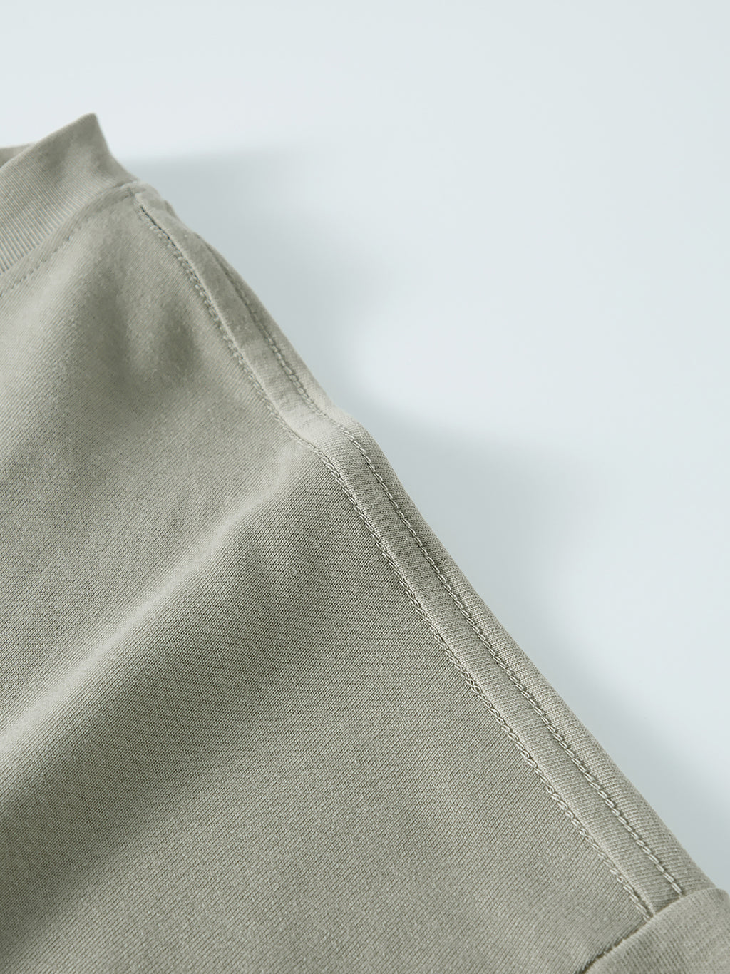 Home & Away Long Sleeve Tee in Oat Gray, construction detail, supplier photograph of the garment