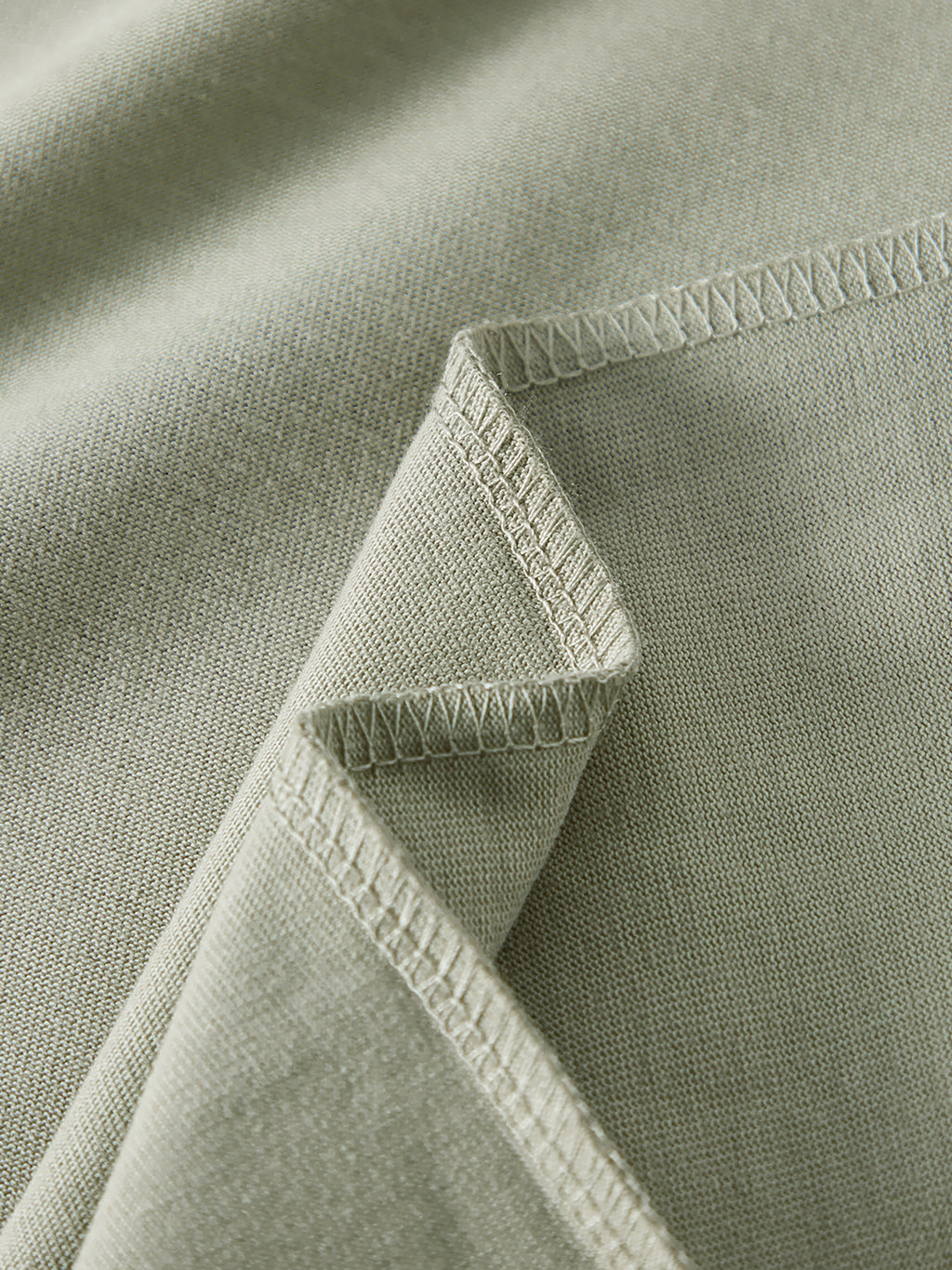 Home & Away Long Sleeve Tee in Oat Gray, construction detail, supplier photograph of the garment