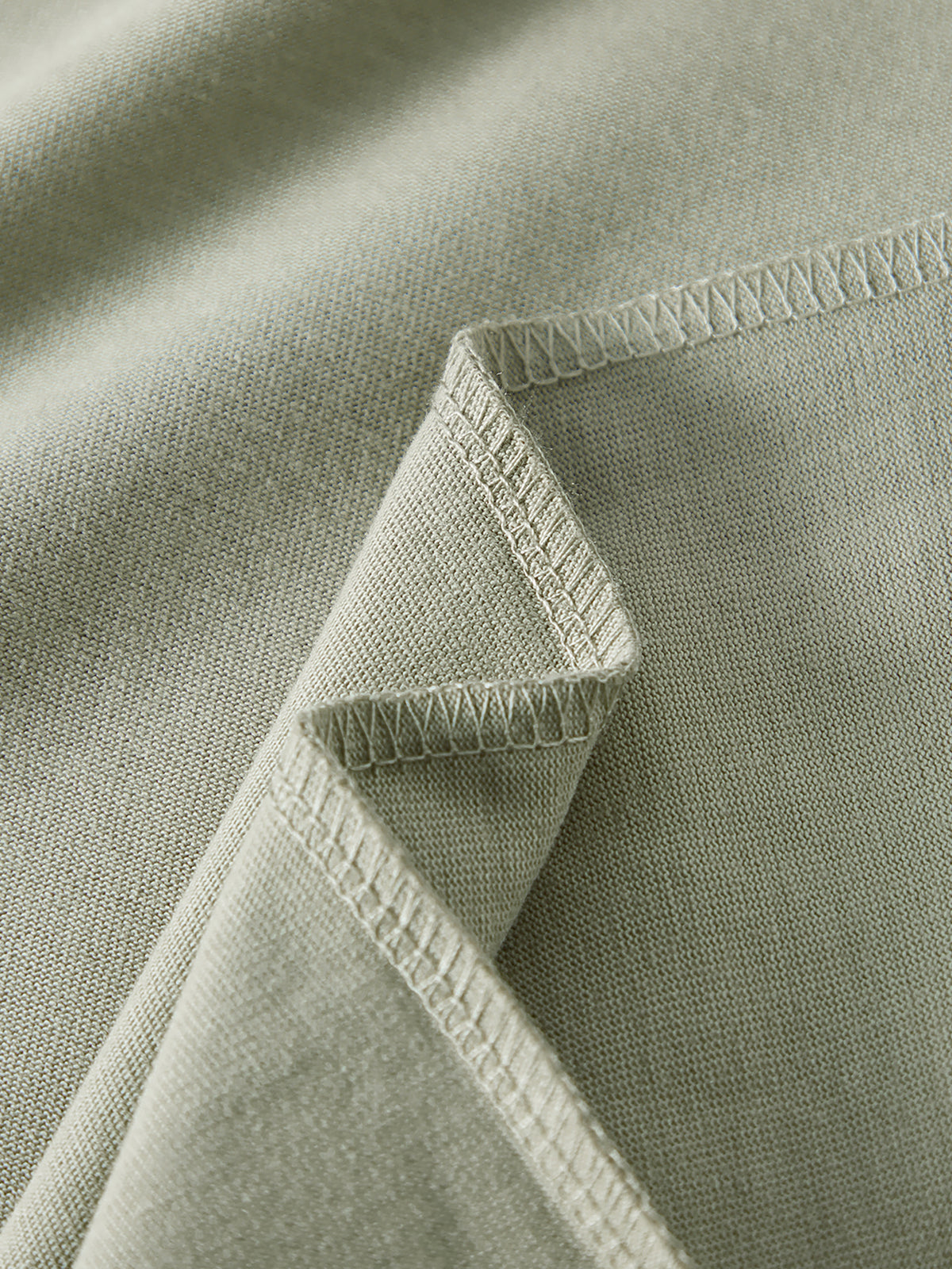 Home & Away Long Sleeve Tee in Oat Gray, construction detail, supplier photograph of the garment