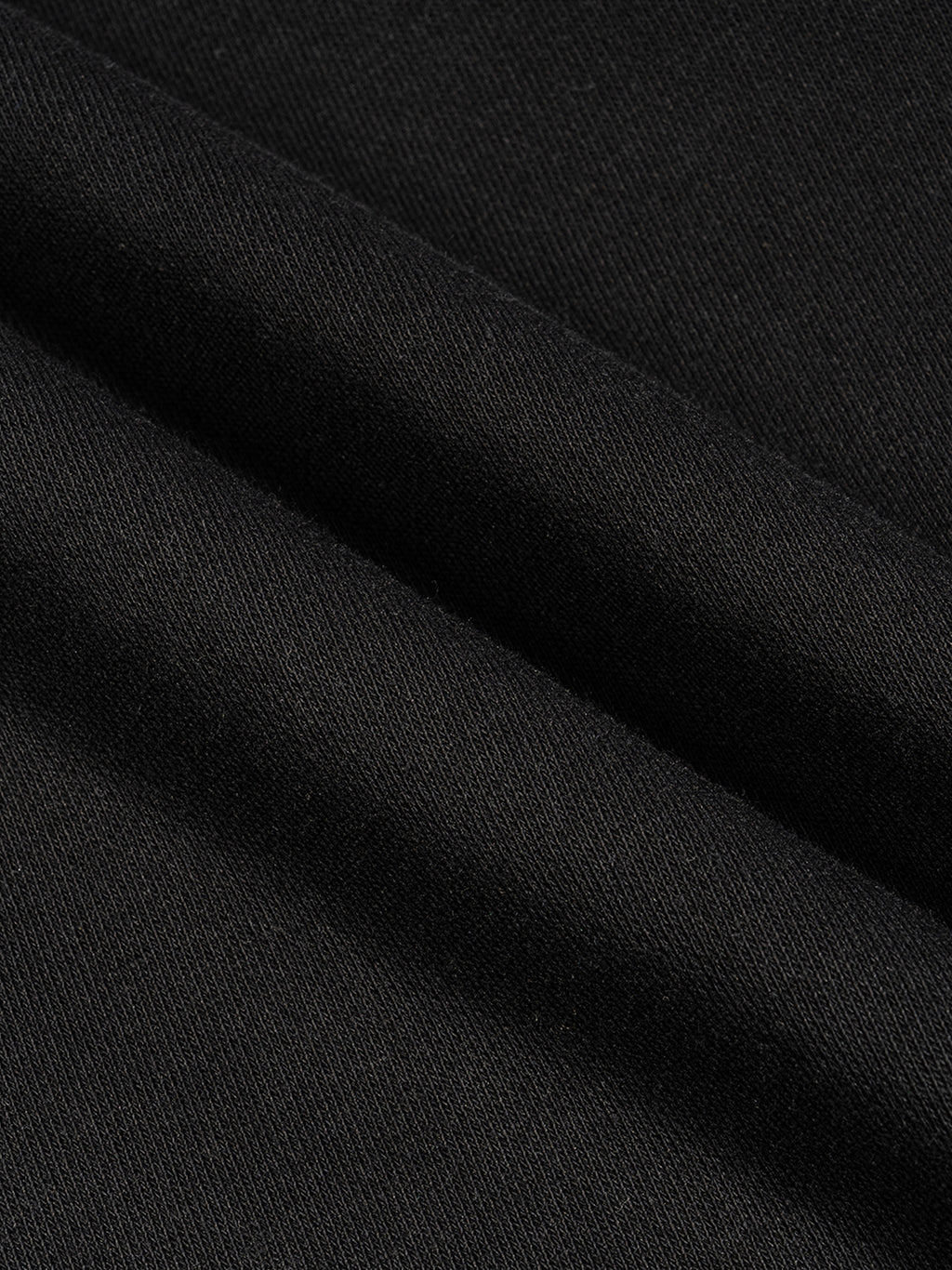 Home & Away Terry Tank in Black, French terry fabric detail, supplier photograph of the garment